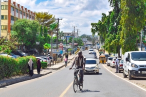 Man on bike riding on a street