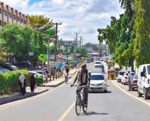 Man on bike riding on a street