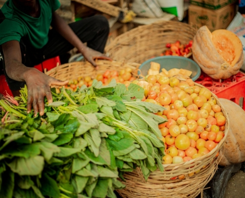 Vibrant Local Market with Fresh Produce Display