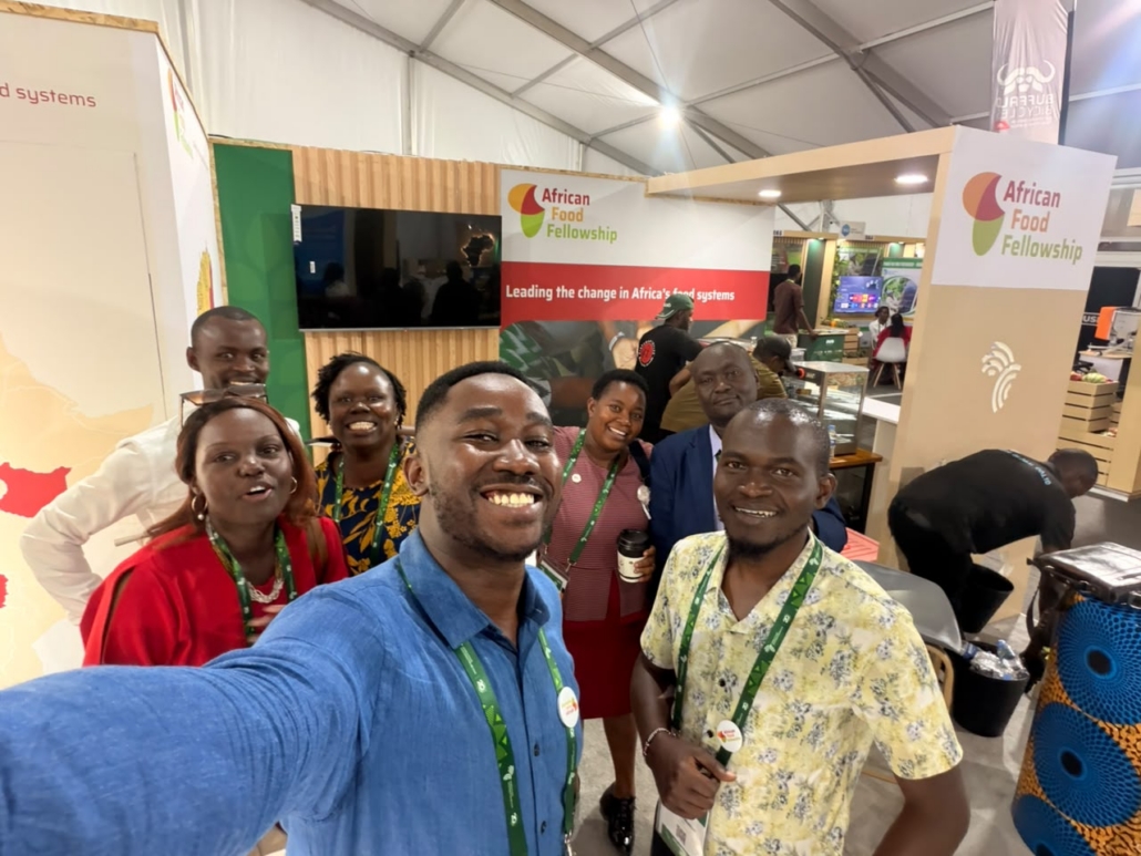 Ledama Masidza with the fellows at the AFF booth